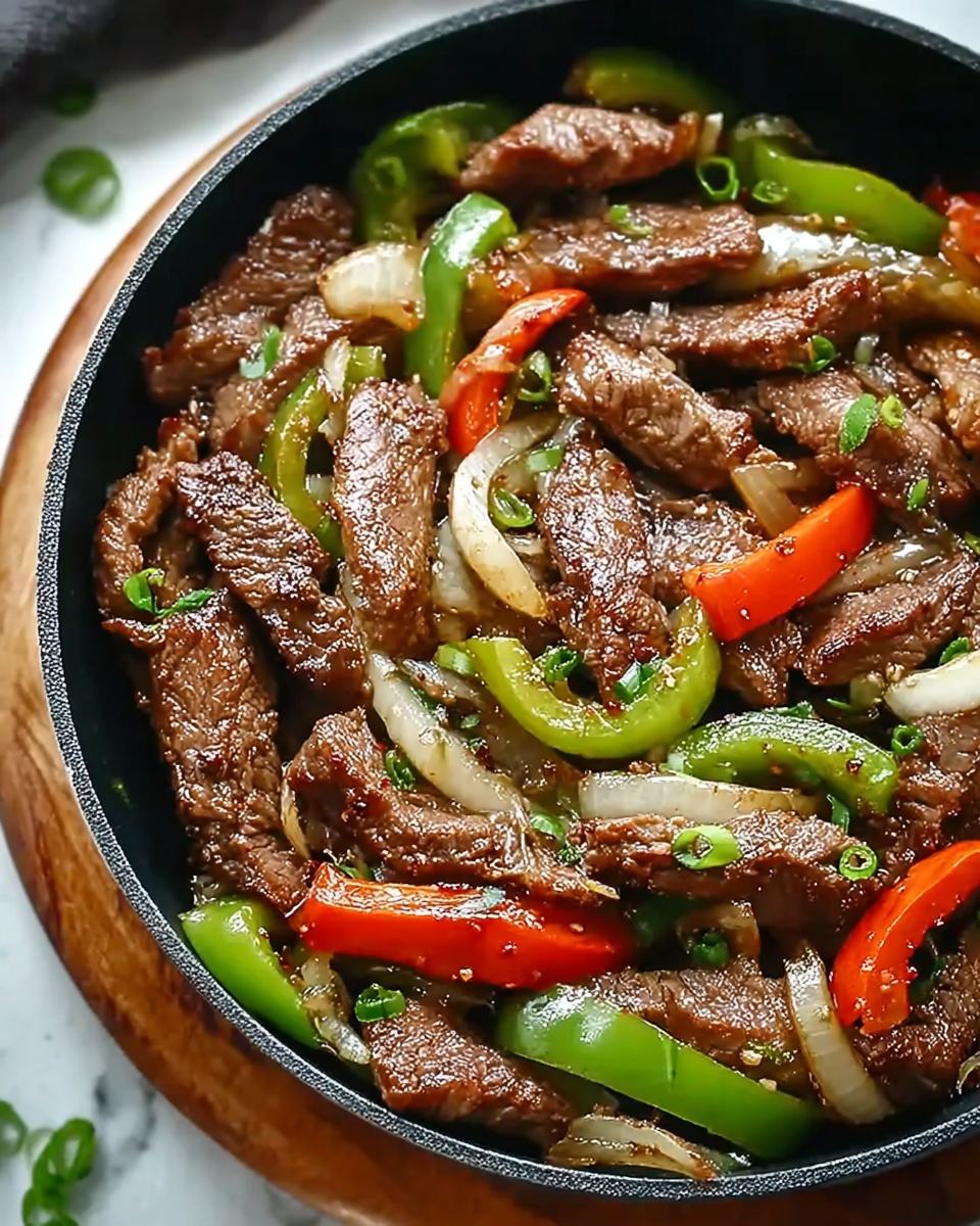 Flavor-Packed Chinese Pepper Steak with Onions Recipe - Recipe Image