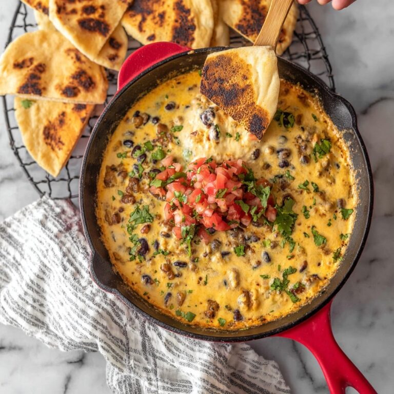 Velveeta Queso Dip with Sausage, Rotel, and Beer Recipe